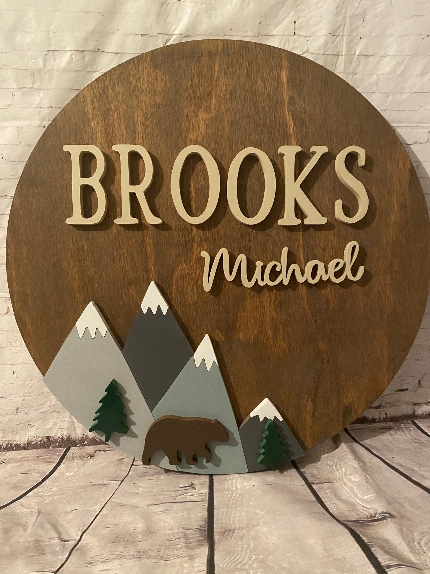 Nursery Name Sign with Small Mountains and Trees